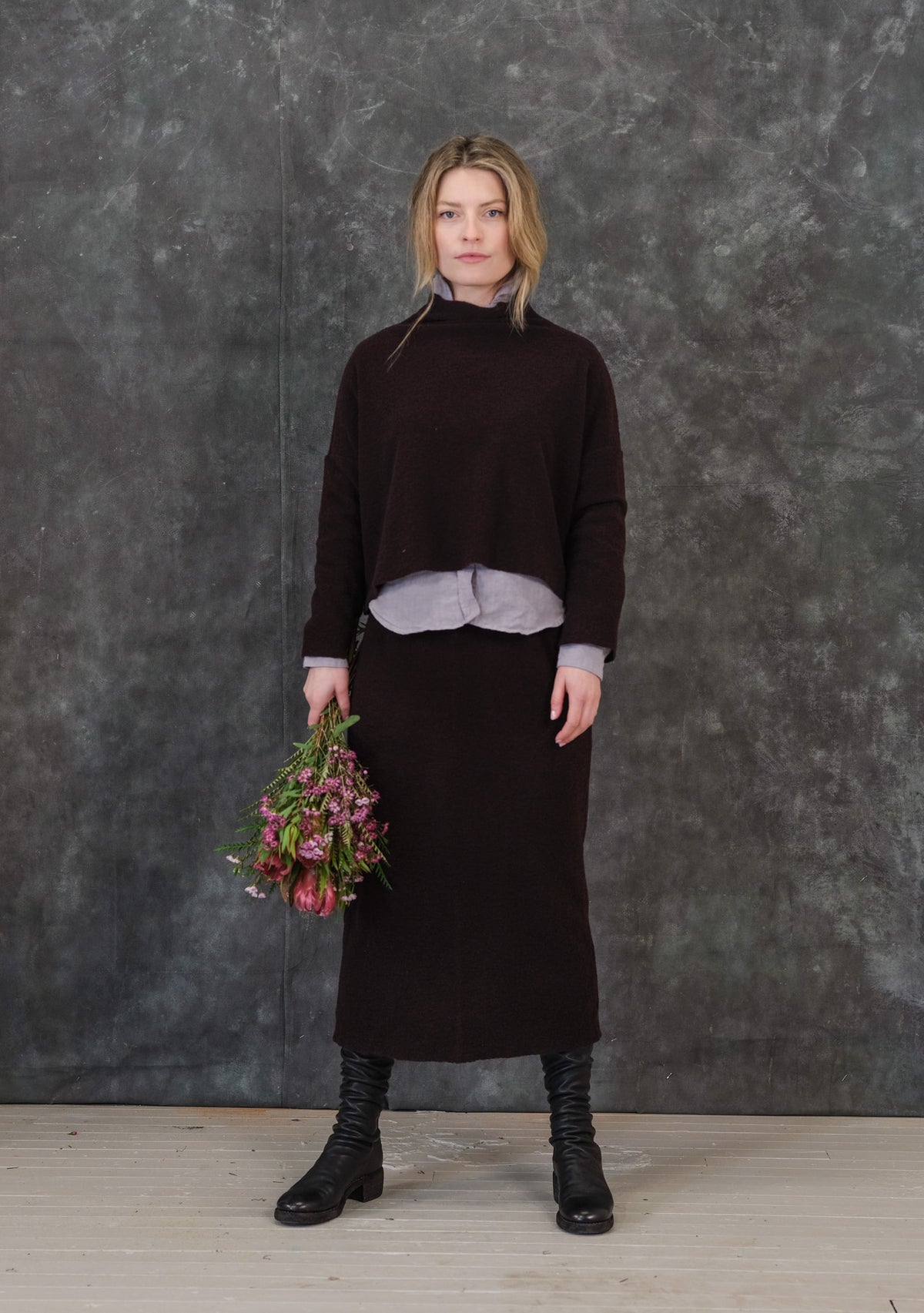 Mona Wool Knit Skirt in Deep Brown, shown on a model